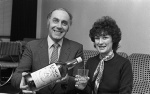 Barrhead News: A lucky winner of a bottle of Langs Whisky presented by the companys' rep. 14th March 1983.