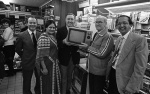South Side News: Ex Celtic Manager Jock Stein presents a TV the winner of a competition run by the Park View Service Station in Glasgow's South Side. 14th March 1983.