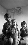 Barrhead News: The Fell family of Lea Avenue, Neilston in their damp house.28th March 1983.